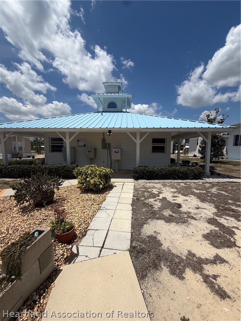 53 Freedom Way Lake Placid, FL 33852 - Photo 26 of 26 a front view of a house with a yard