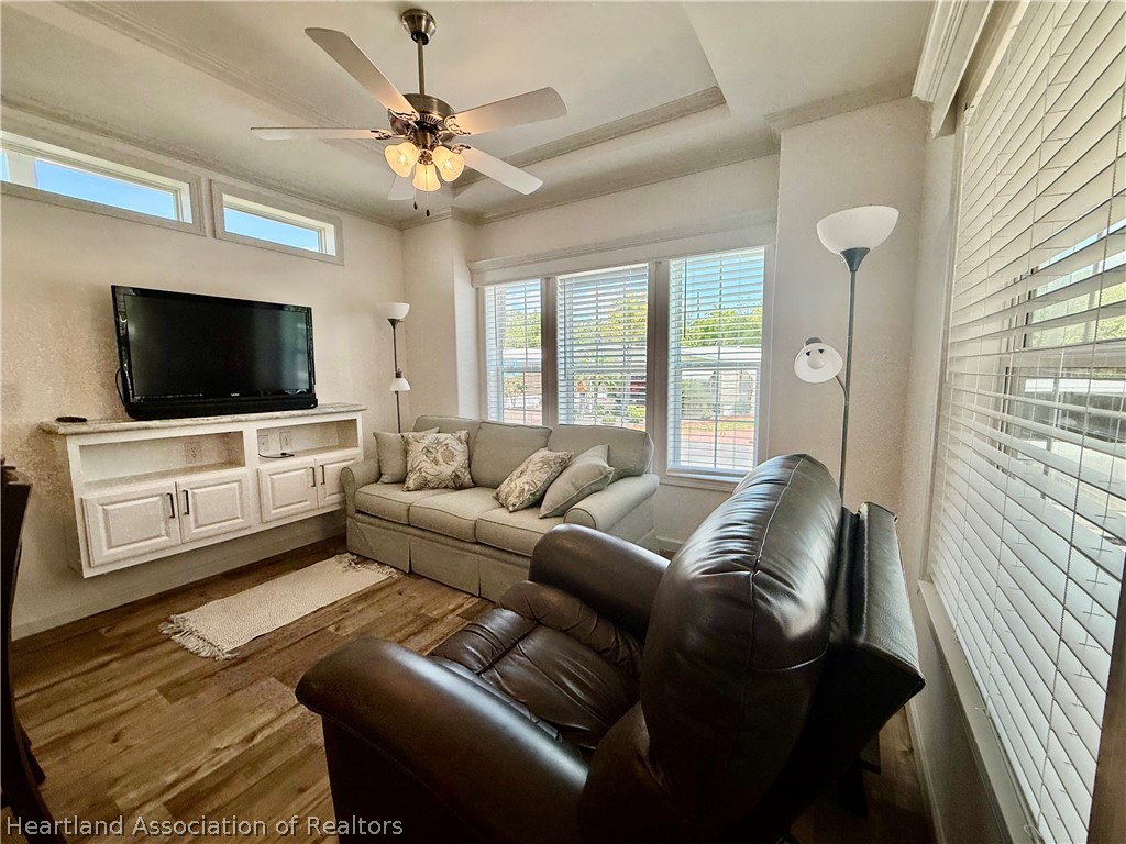 53 Freedom Way Lake Placid, FL 33852 - Photo 5 of 26 a living room with furniture and a flat screen tv