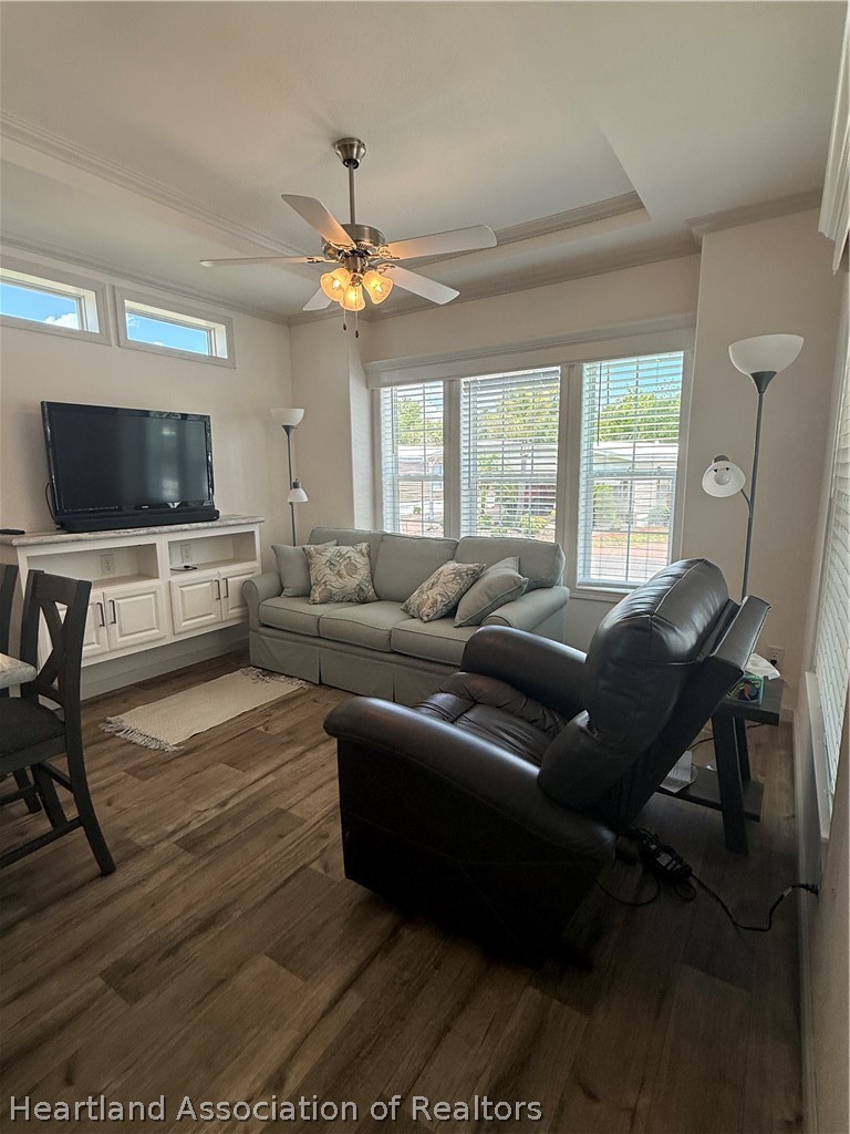 53 Freedom Way Lake Placid, FL 33852 - Photo 6 of 26 a living room with furniture and a flat screen tv