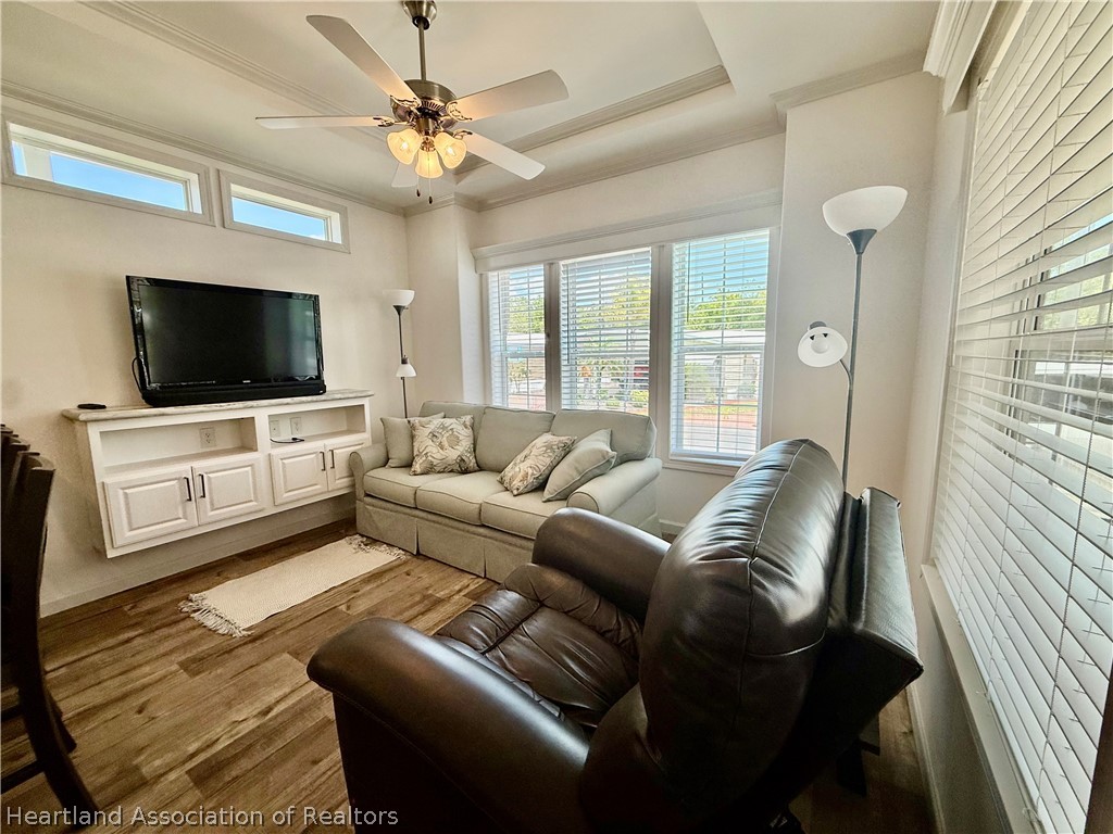 53 Freedom Way Lake Placid, FL 33852 - Photo 7 of 26 a living room with furniture and a flat screen tv
