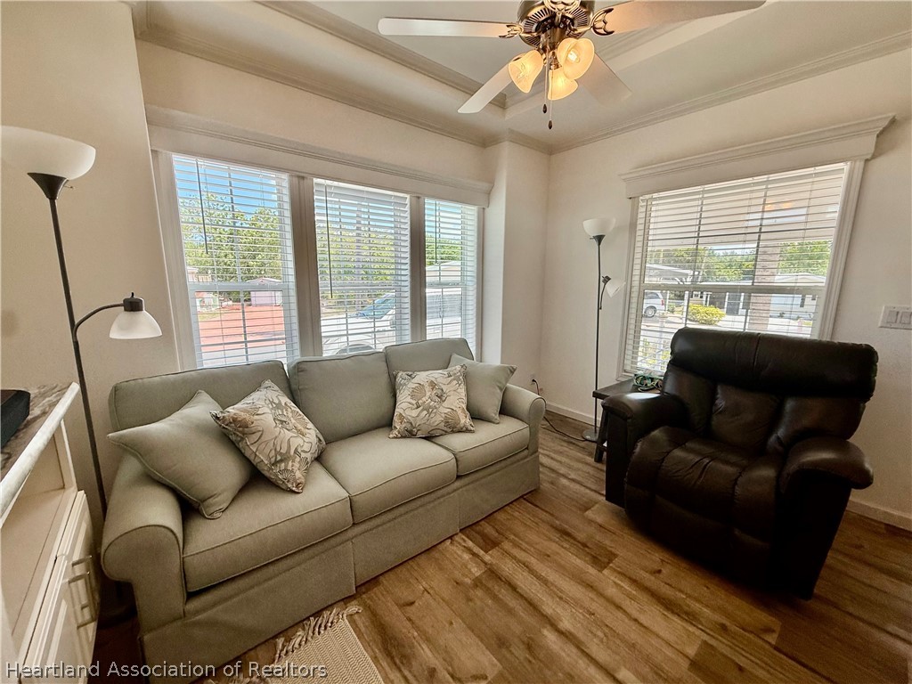 53 Freedom Way Lake Placid, FL 33852 - Photo 8 of 26 a living room with furniture and a large window