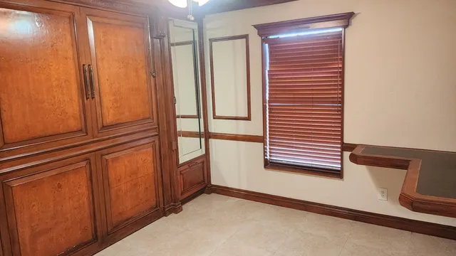 a view of a hallway with closet