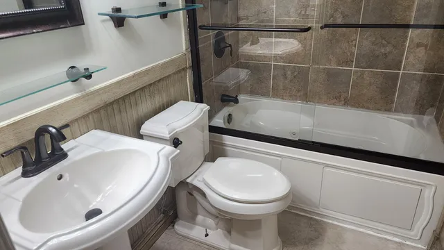 a bathroom with a sink and toilet