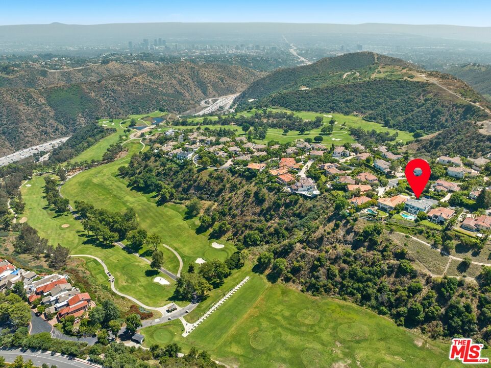 12519 Promontory Road Los Angeles, CA 90049 - Photo 7 of 10 a view of a city
