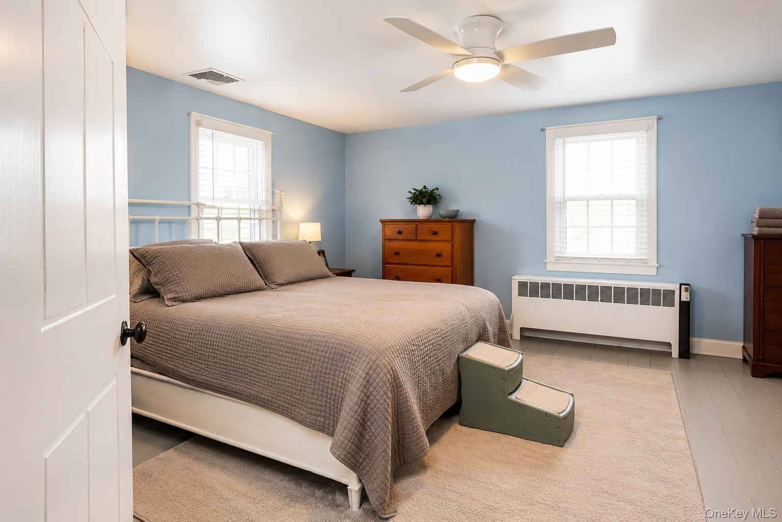 340 Dunn Road Montgomery, NY 12549 - Photo 25 of 34 Main bedroom with carpeted flooring, ceiling fan and natural light