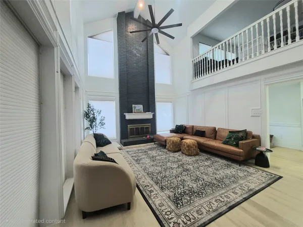 a living room with furniture and a rug