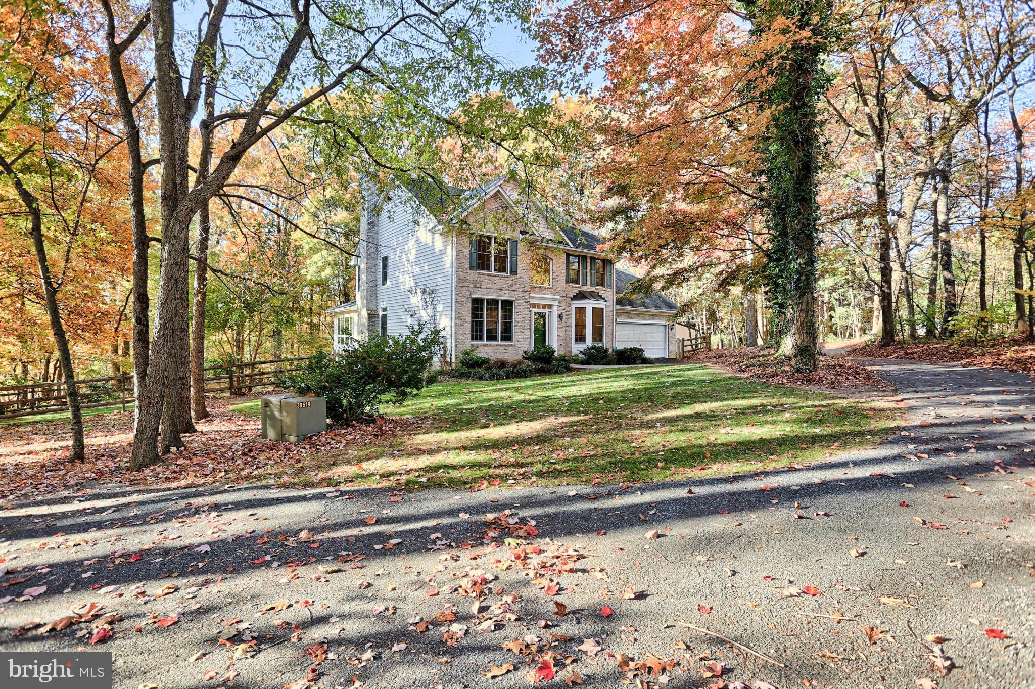 4905 Teen Barnes Road Frederick, MD 21703 - Photo 1 of 30 a view of a house with a big yard plants and large trees