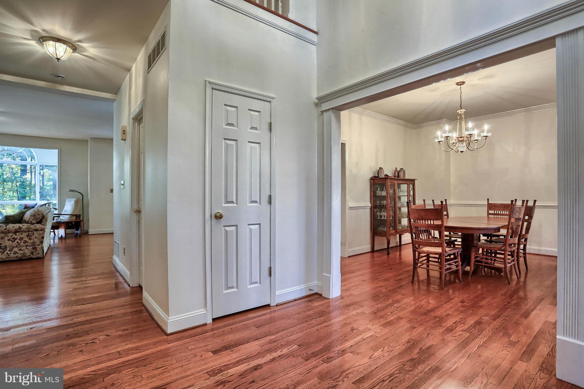 4905 Teen Barnes Road Frederick, MD 21703 - Photo 8 of 30 a view of a dining room with furniture and wooden floor