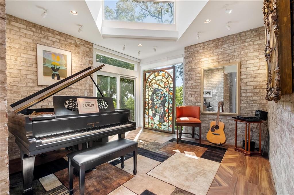 2437 Mt Royal Road Pittsburgh, PA 15217 - Photo 11 of 39 a living room filled with furniture and a potted plant