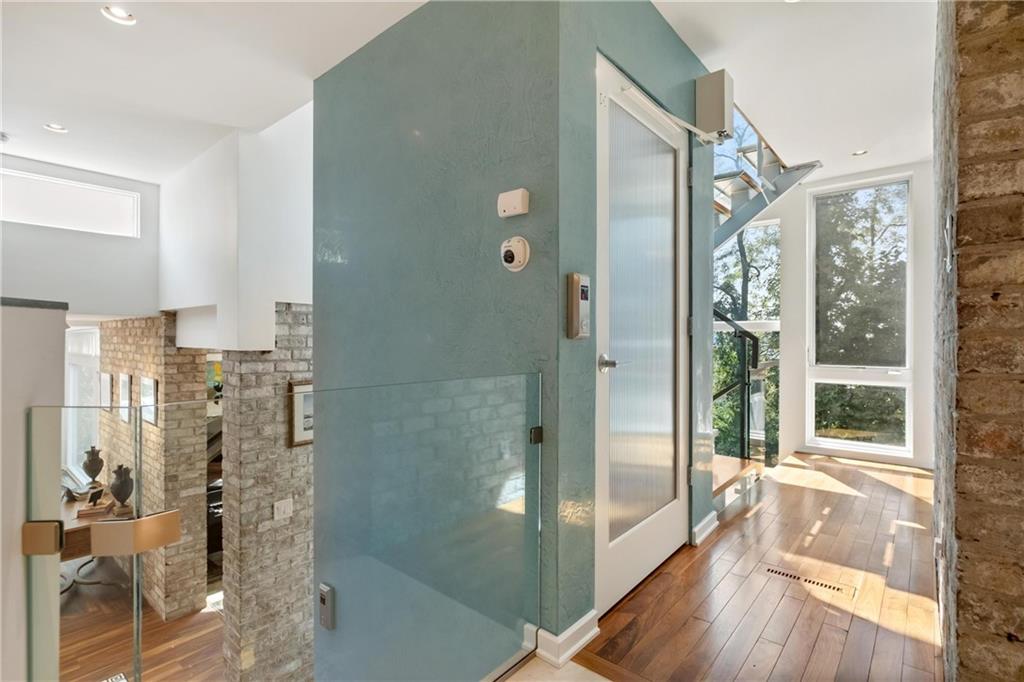 2437 Mt Royal Road Pittsburgh, PA 15217 - Photo 13 of 39 a bathroom with a glass shower door and a glass door