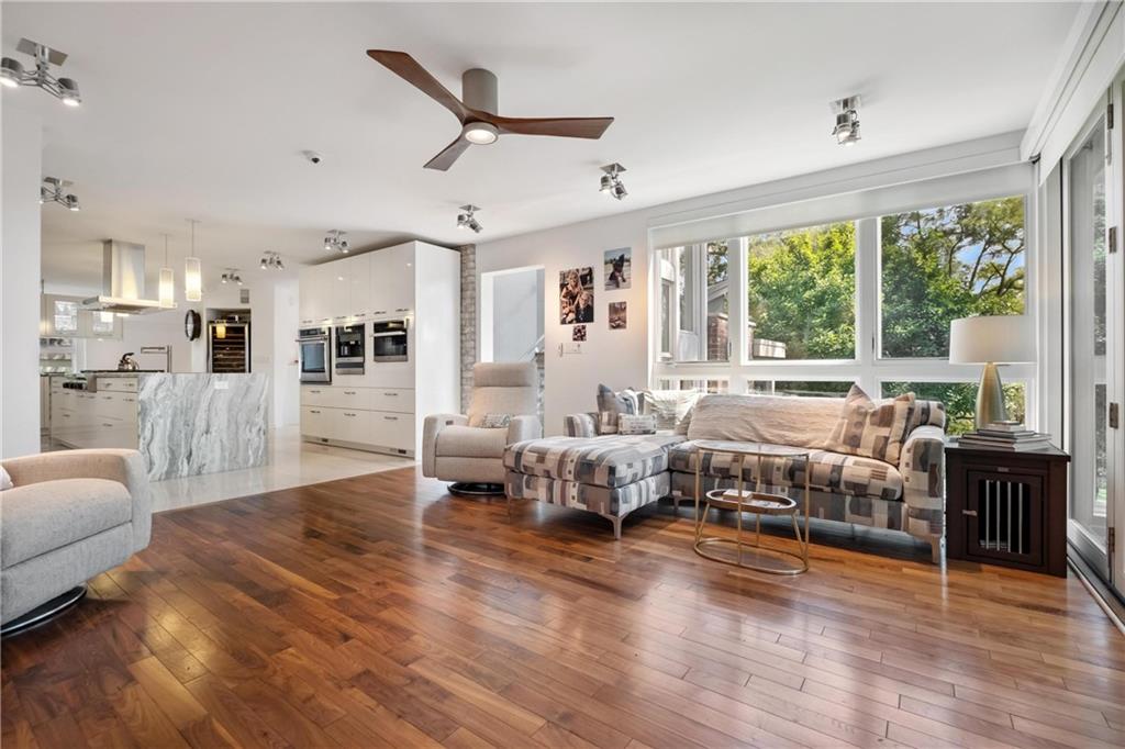 2437 Mt Royal Road Pittsburgh, PA 15217 - Photo 16 of 39 a living room with furniture and a large window