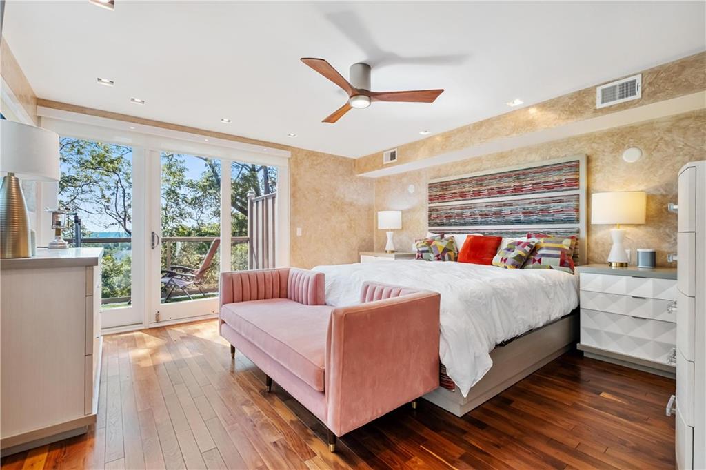 2437 Mt Royal Road Pittsburgh, PA 15217 - Photo 24 of 39 a spacious bedroom with a bed and a large window