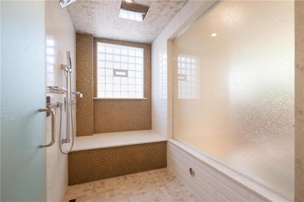 2437 Mt Royal Road Pittsburgh, PA 15217 - Photo 27 of 39 a bathroom with a bathtub and shower
