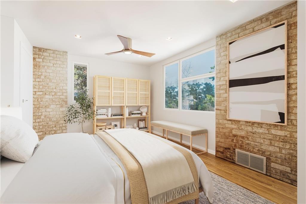 2437 Mt Royal Road Pittsburgh, PA 15217 - Photo 29 of 39 a bedroom with a large bed and a window