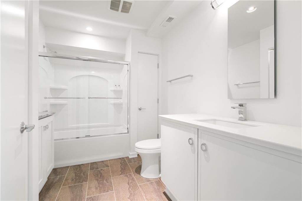 2437 Mt Royal Road Pittsburgh, PA 15217 - Photo 32 of 39 a bathroom with a sink a toilet and shower