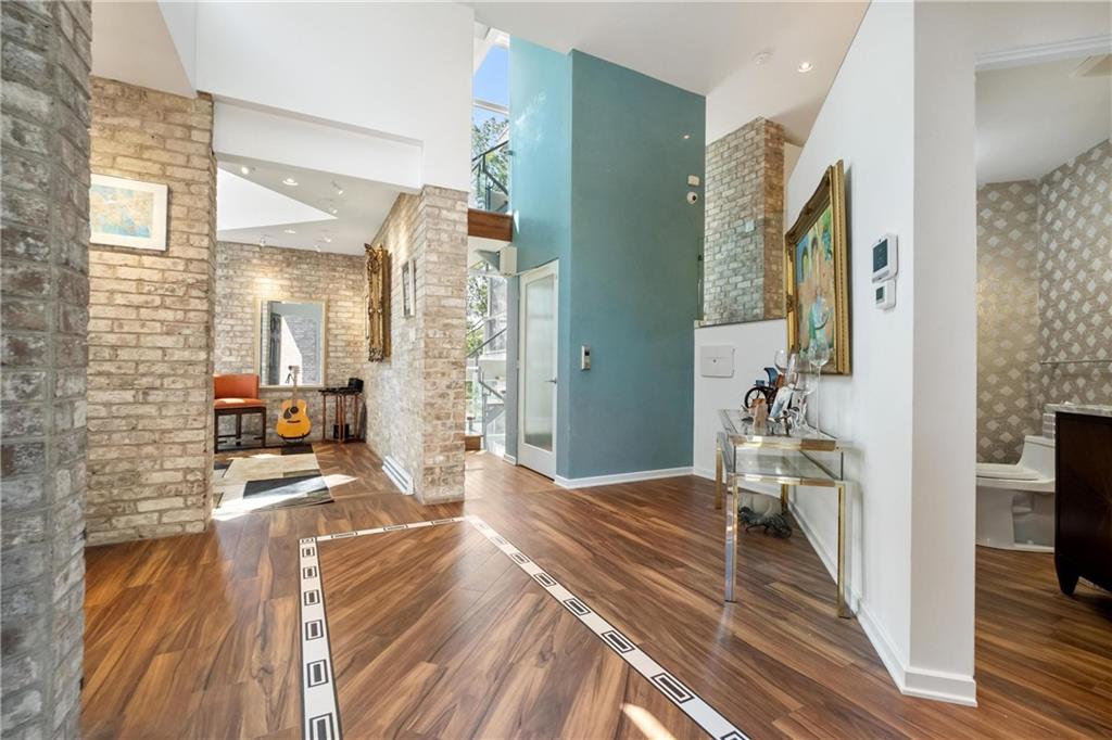 2437 Mt Royal Road Pittsburgh, PA 15217 - Photo 7 of 39 a bedroom with a bed and a view of living room