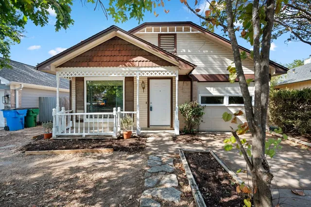 a front view of a house with a outdoor space