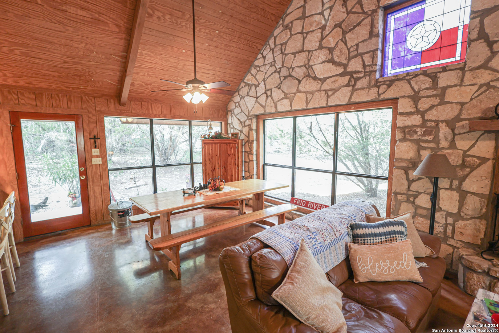 1177 River Road Concan, TX 78838 - Photo 6 of 34 a living room with furniture and a large window