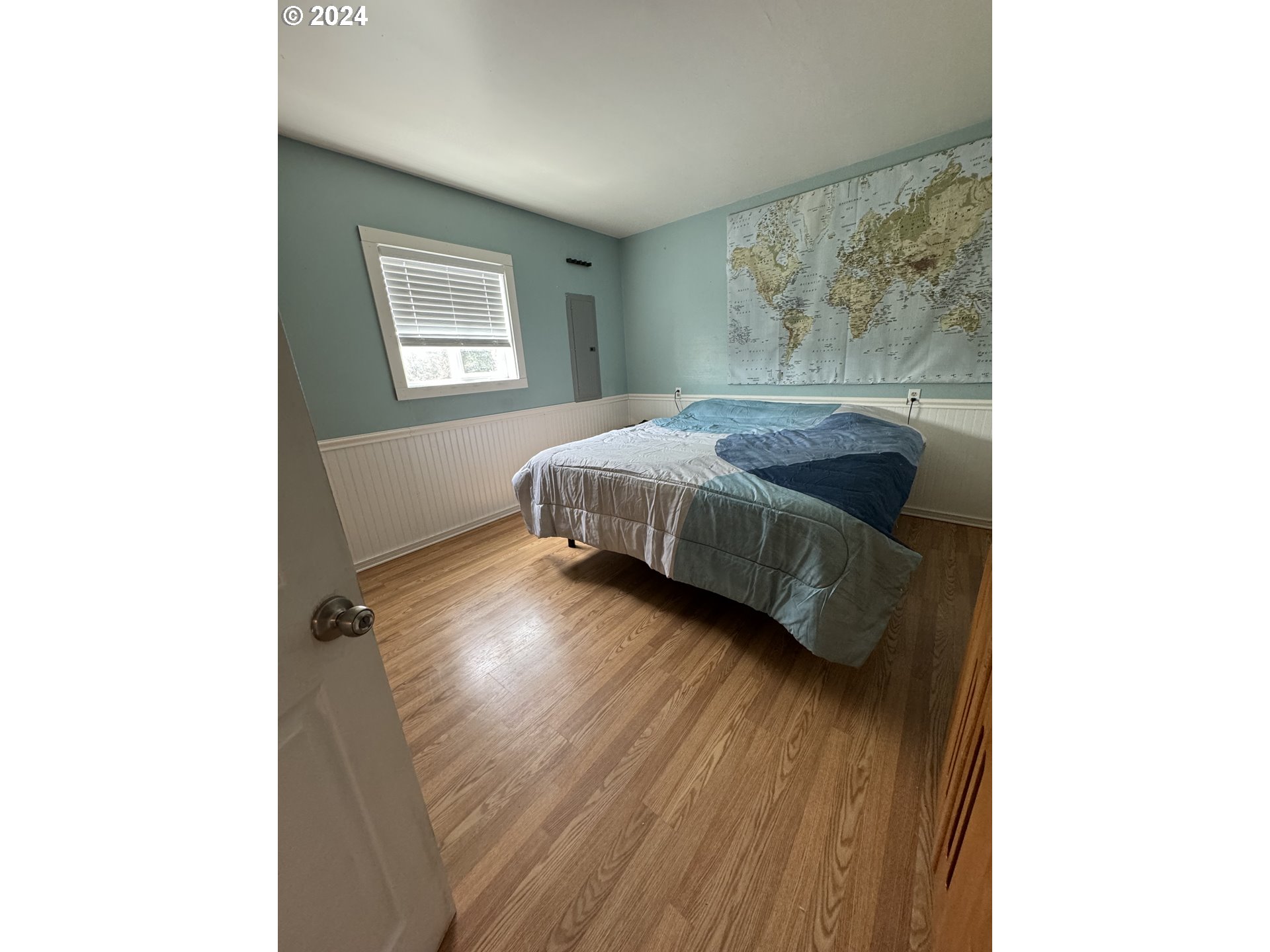 508 3rd Avenue Dallesport, WA 98617 - Photo 19 of 48 a bedroom with a bed and a window