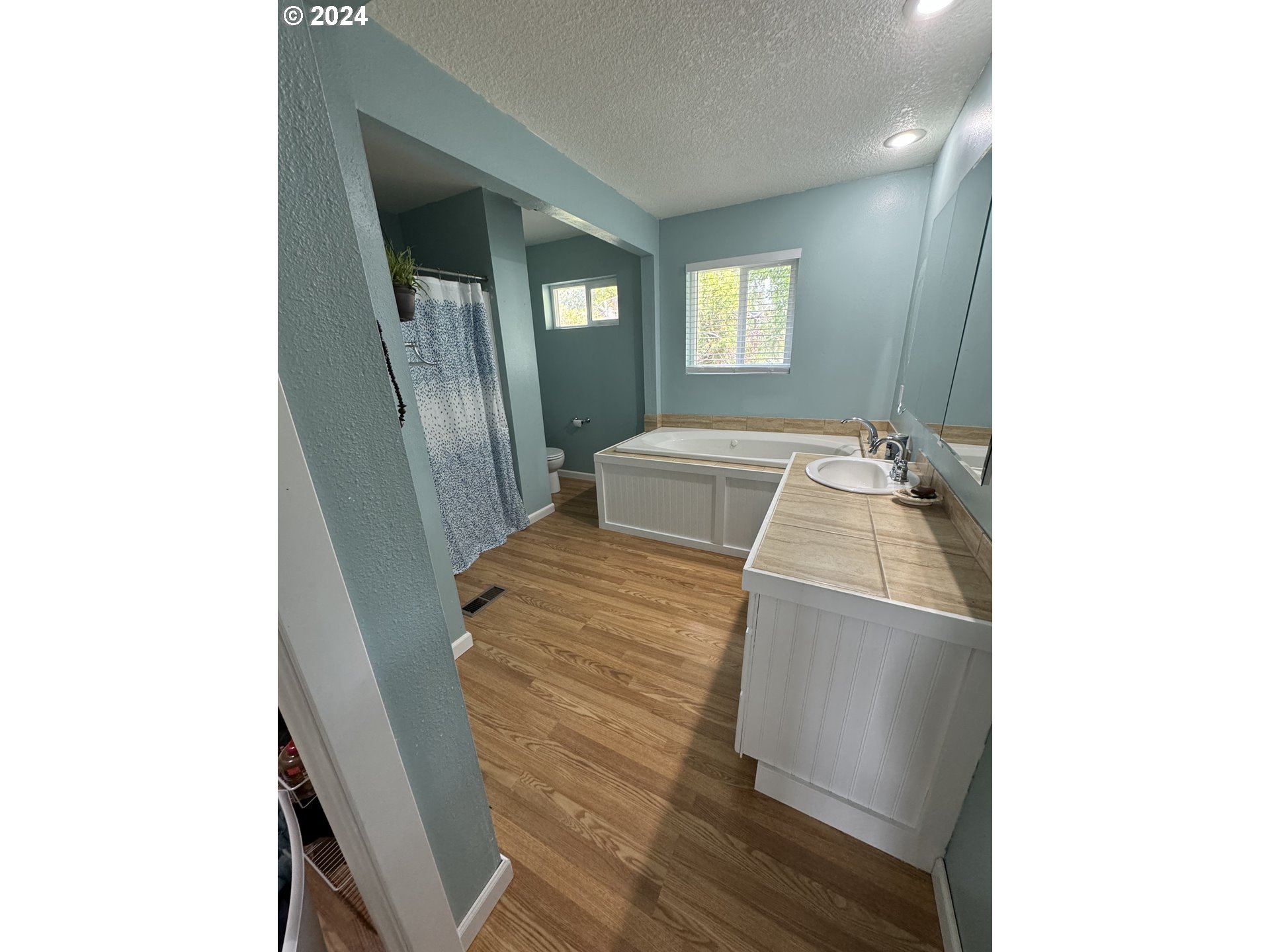 508 3rd Avenue Dallesport, WA 98617 - Photo 2 of 48 a bedroom with a bed and window