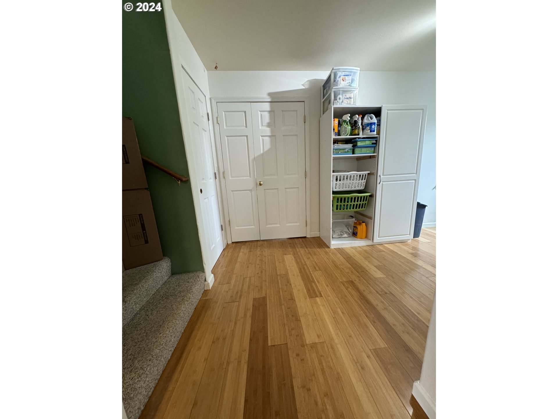 508 3rd Avenue Dallesport, WA 98617 - Photo 28 of 48 a view of a bedroom with wooden floor and closet