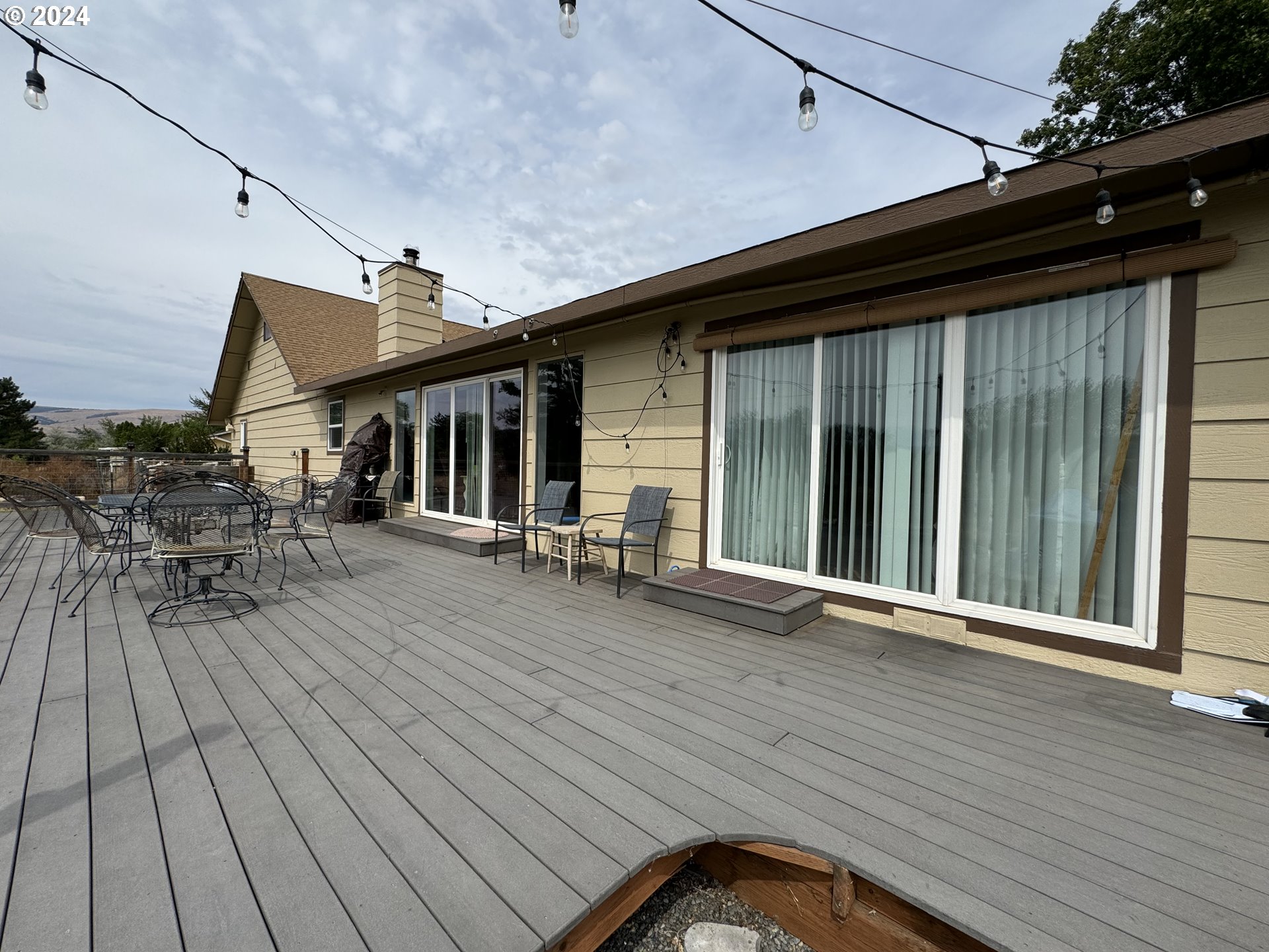 508 3rd Avenue Dallesport, WA 98617 - Photo 37 of 48 a backyard of a house with seating space