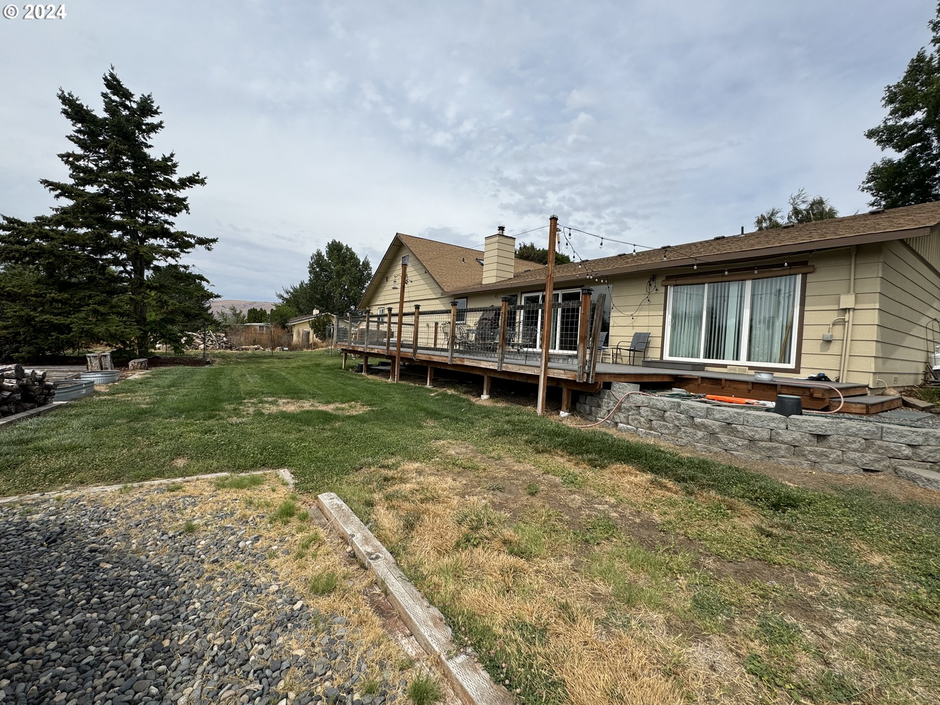 508 3rd Avenue Dallesport, WA 98617 - Photo 38 of 48 a view of a house with a yard
