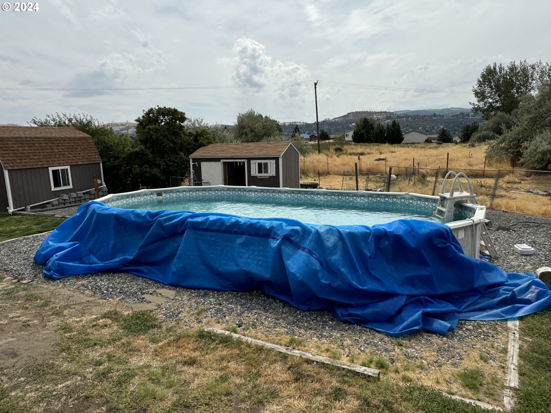 508 3rd Avenue Dallesport, WA 98617 - Photo 44 of 48 a view of a house with a yard