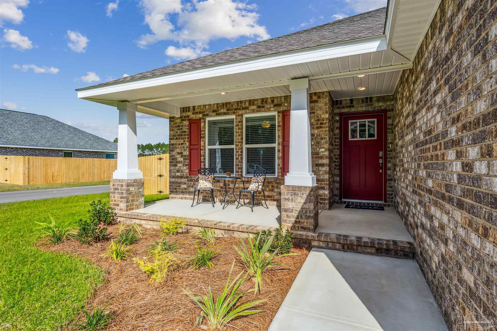 3494 Doyle Hawkins Road Navarre, FL 32566 - Photo 30 of 30 a view of a house with sitting area