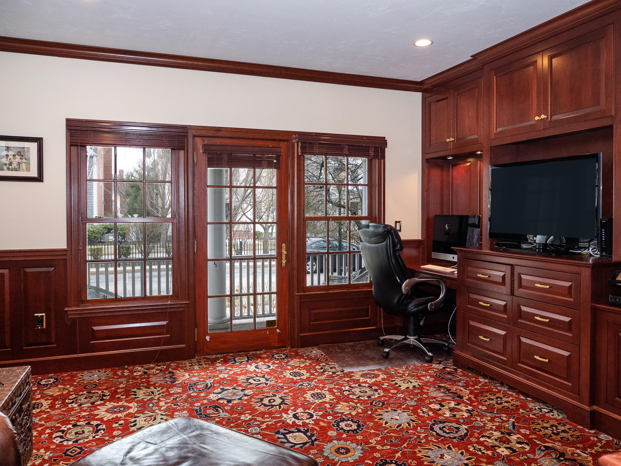 7 Preston Square, Unit 7 Quincy, MA 02171 - Photo 15 of 30 a living room with furniture cabinets and a flat screen tv