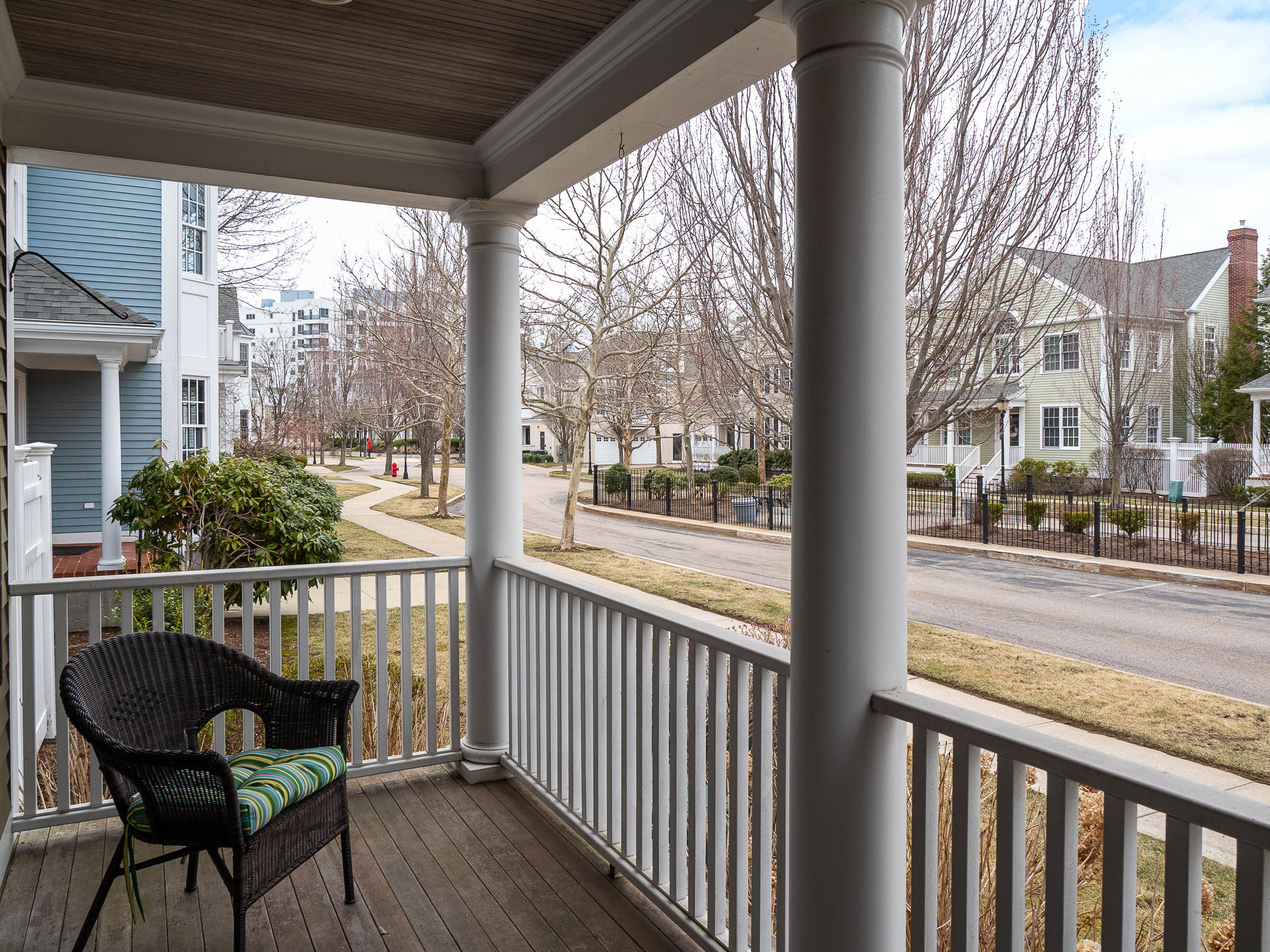 7 Preston Square, Unit 7 Quincy, MA 02171 - Photo 16 of 30 a view of a chair and tables in the balcony