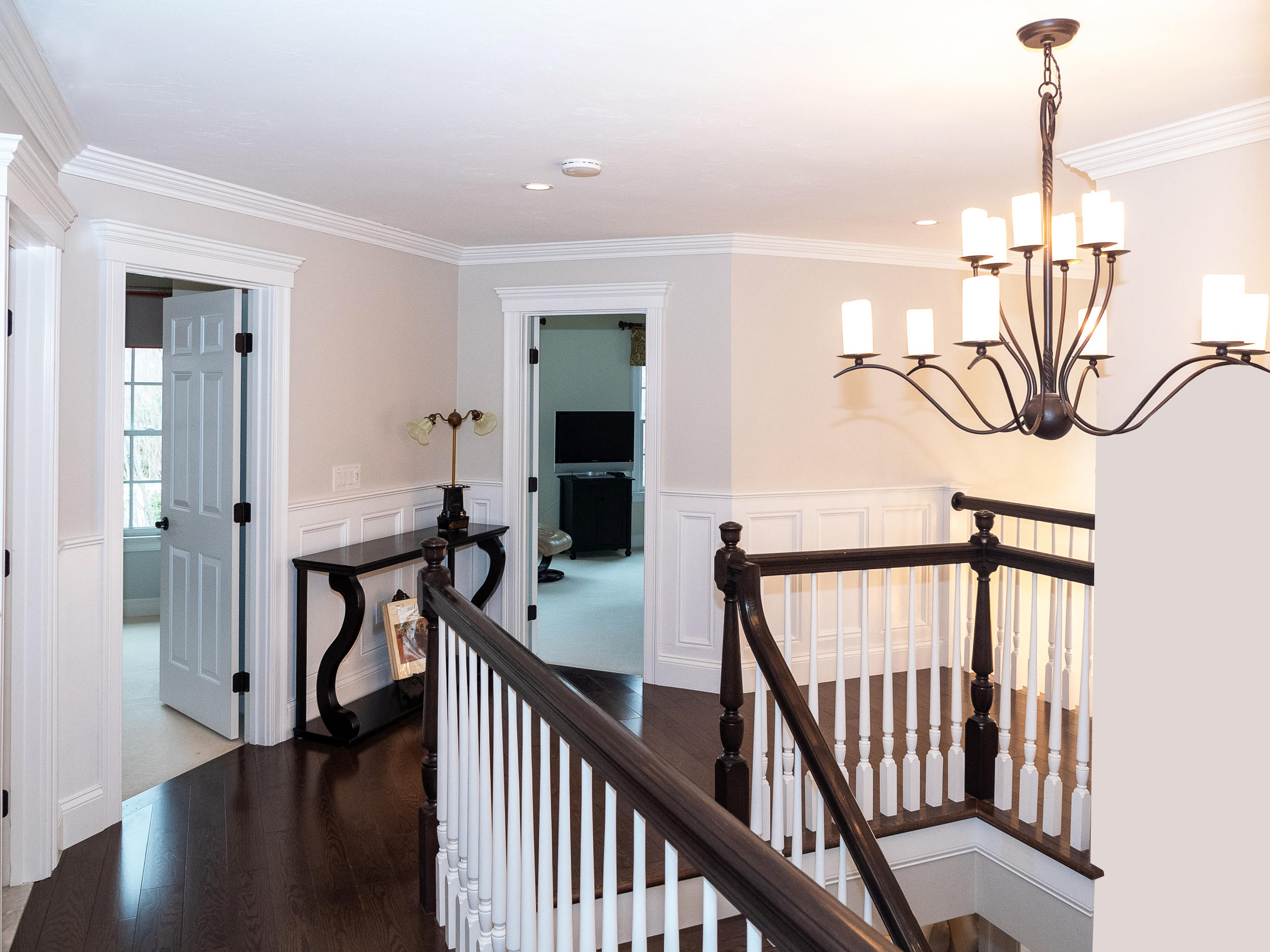 7 Preston Square, Unit 7 Quincy, MA 02171 - Photo 19 of 30 a view of a hallway with the wooden floor and staircase