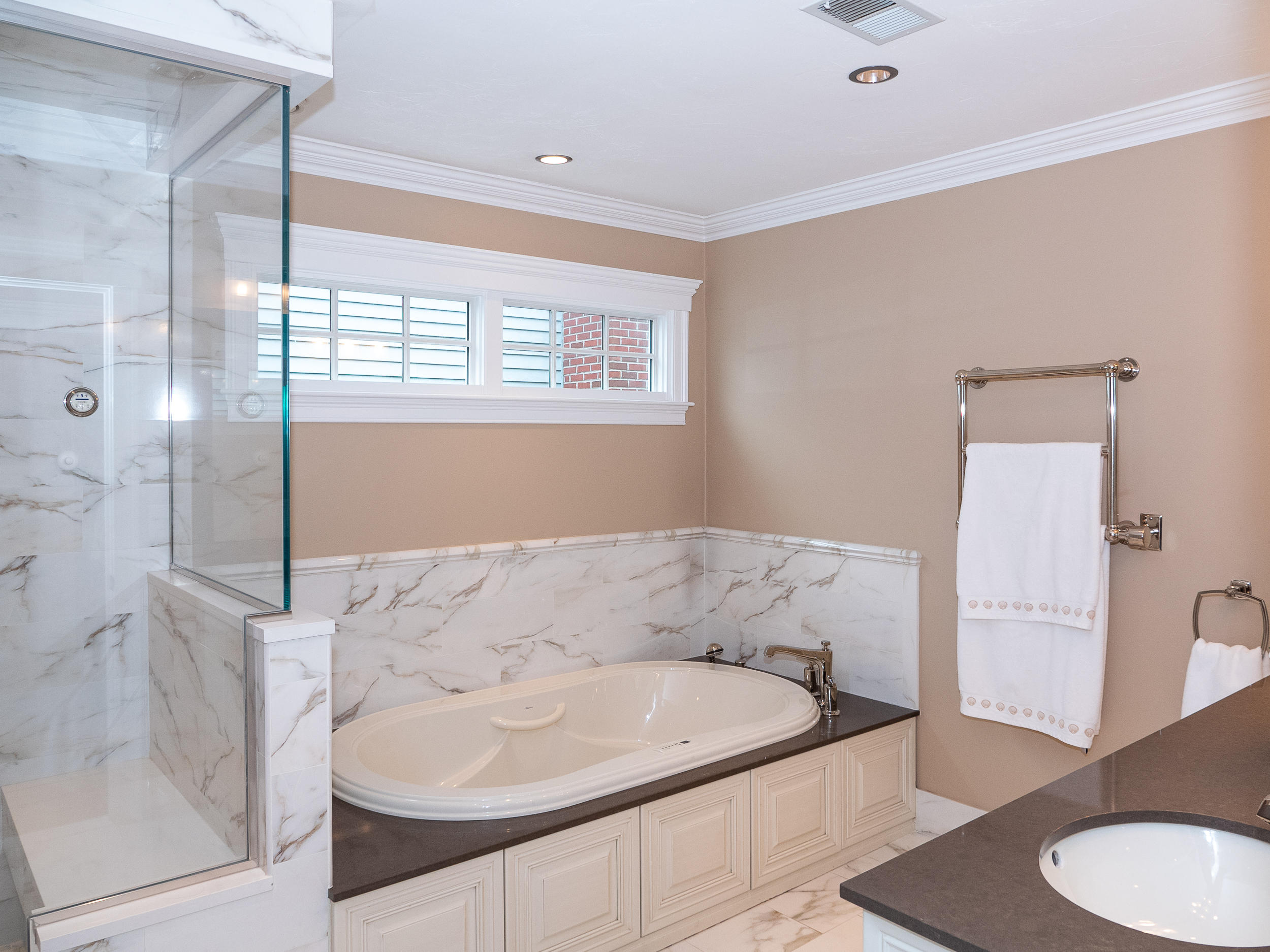 7 Preston Square, Unit 7 Quincy, MA 02171 - Photo 23 of 30 a bath room with a sink and a mirror