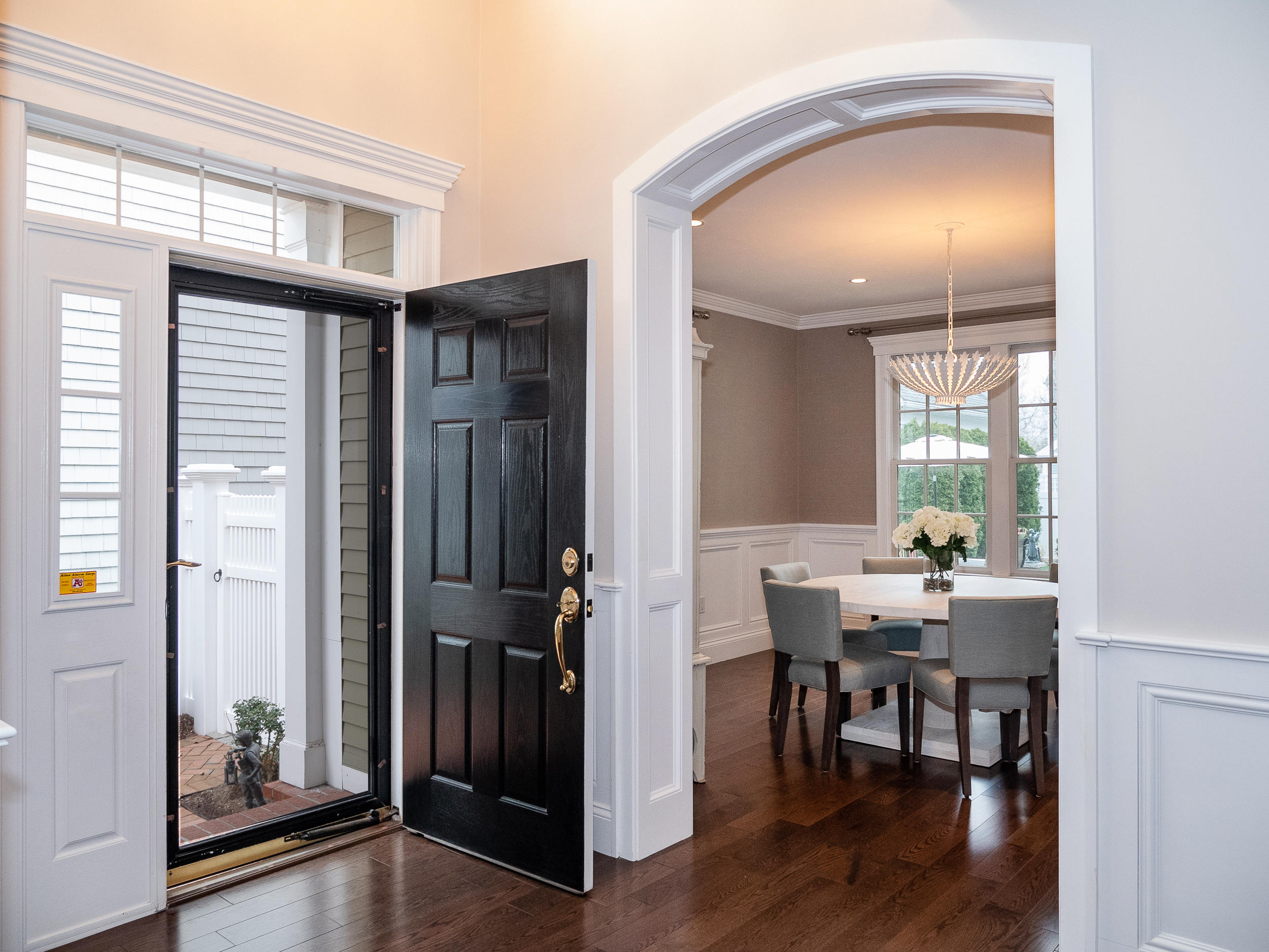 7 Preston Square, Unit 7 Quincy, MA 02171 - Photo 3 of 30 a view of a livingroom with furniture and hardwood floor