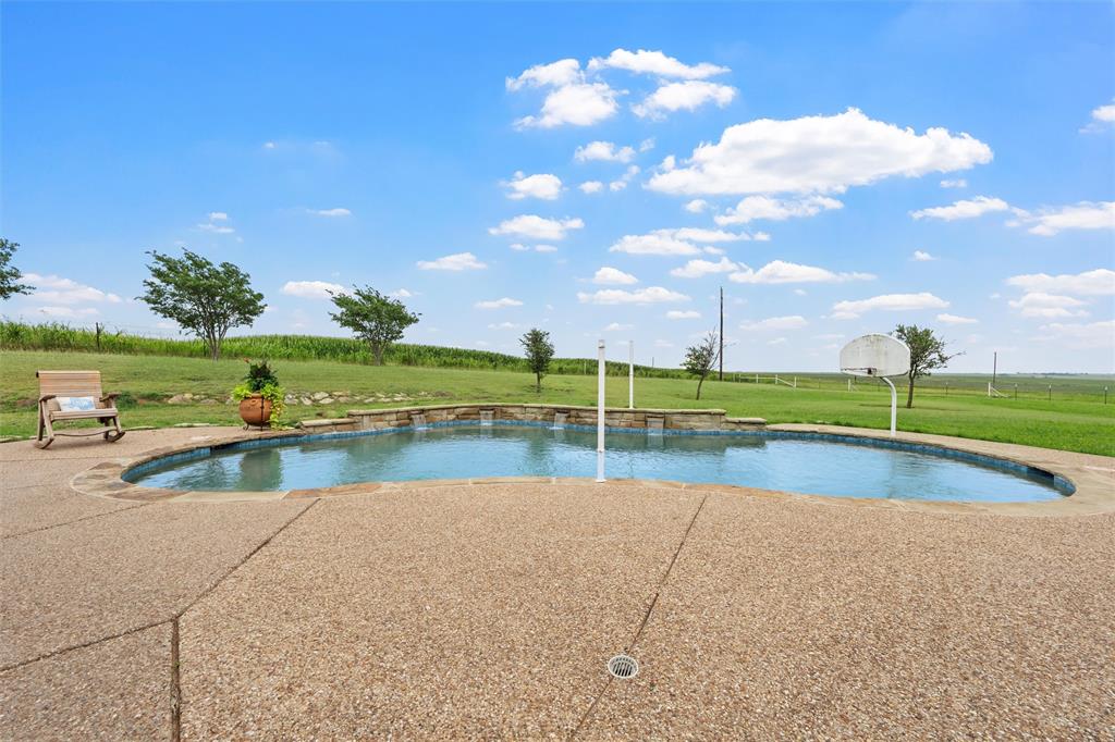 3057 Holy Road Abbott, TX 76621 - Photo 36 of 39 a view of a lake with a yard