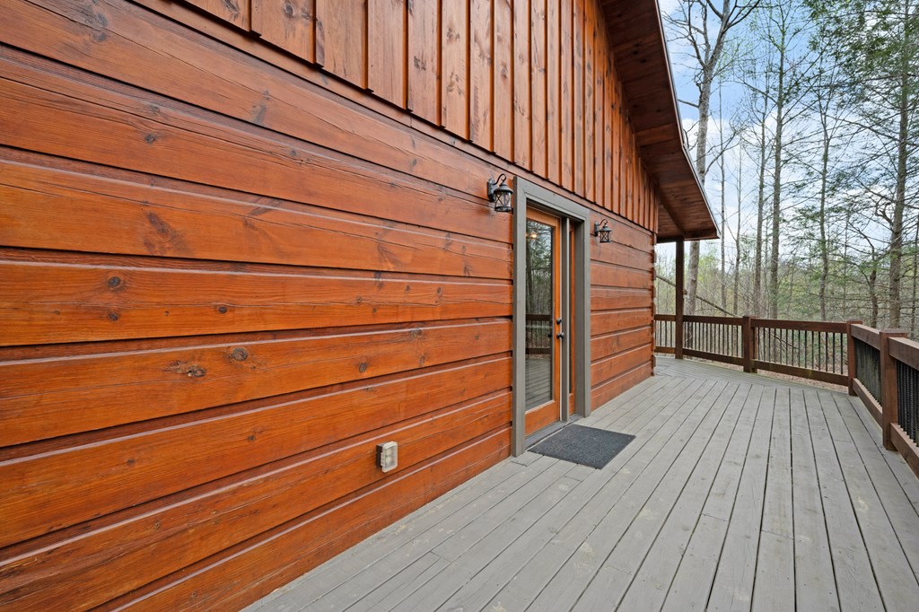 136 B Pack Creek Road Blue Ridge, GA 30513 - Photo 47 of 87 a view of a house with a wooden deck
