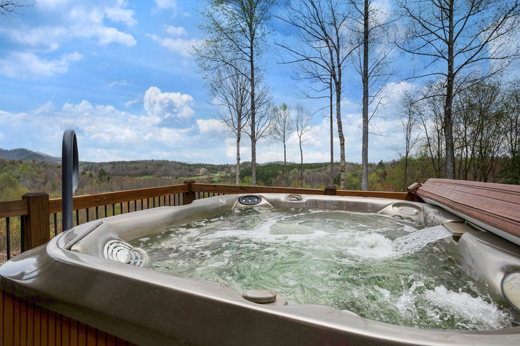 136 B Pack Creek Road Blue Ridge, GA 30513 - Photo 51 of 87 a view of a swimming pool with a patio