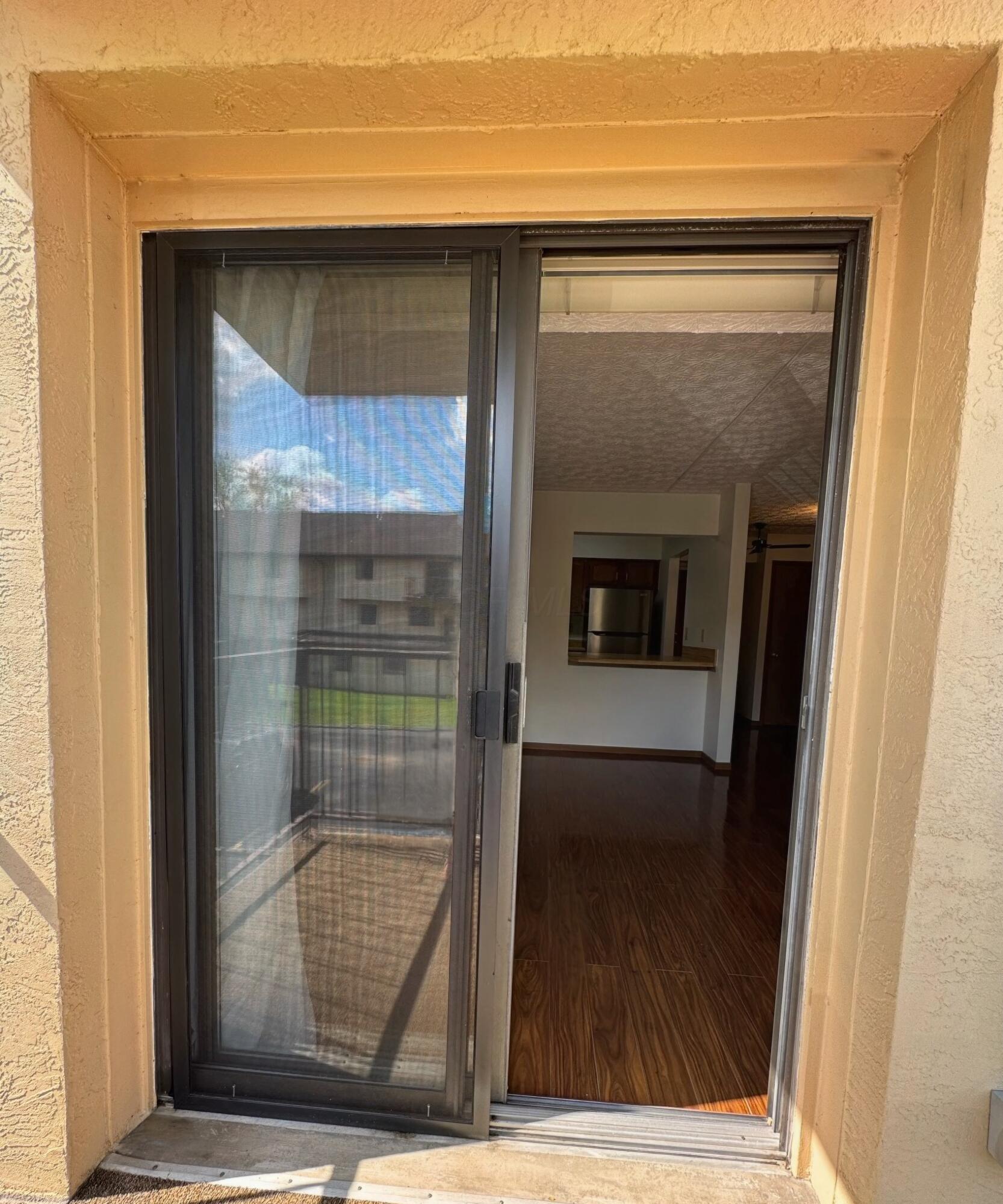 3967 Karl Road, Unit 227 Columbus, OH 43224 - Photo 17 of 39 Patio doors off living room