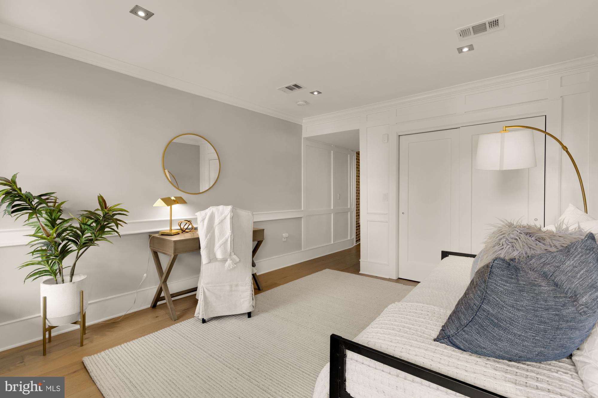 1735 1st Street Northwest, Unit 2 Washington, DC 20001 - Photo 17 of 38 a living room with furniture a rug and a potted plant