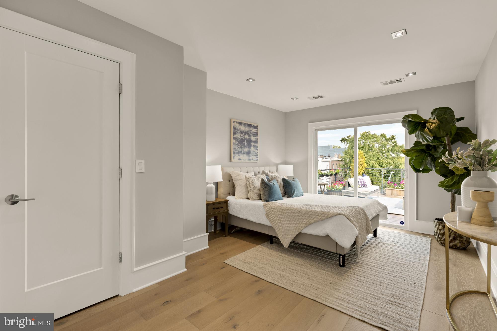 1735 1st Street Northwest, Unit 2 Washington, DC 20001 - Photo 20 of 38 a bed room with bed and a window