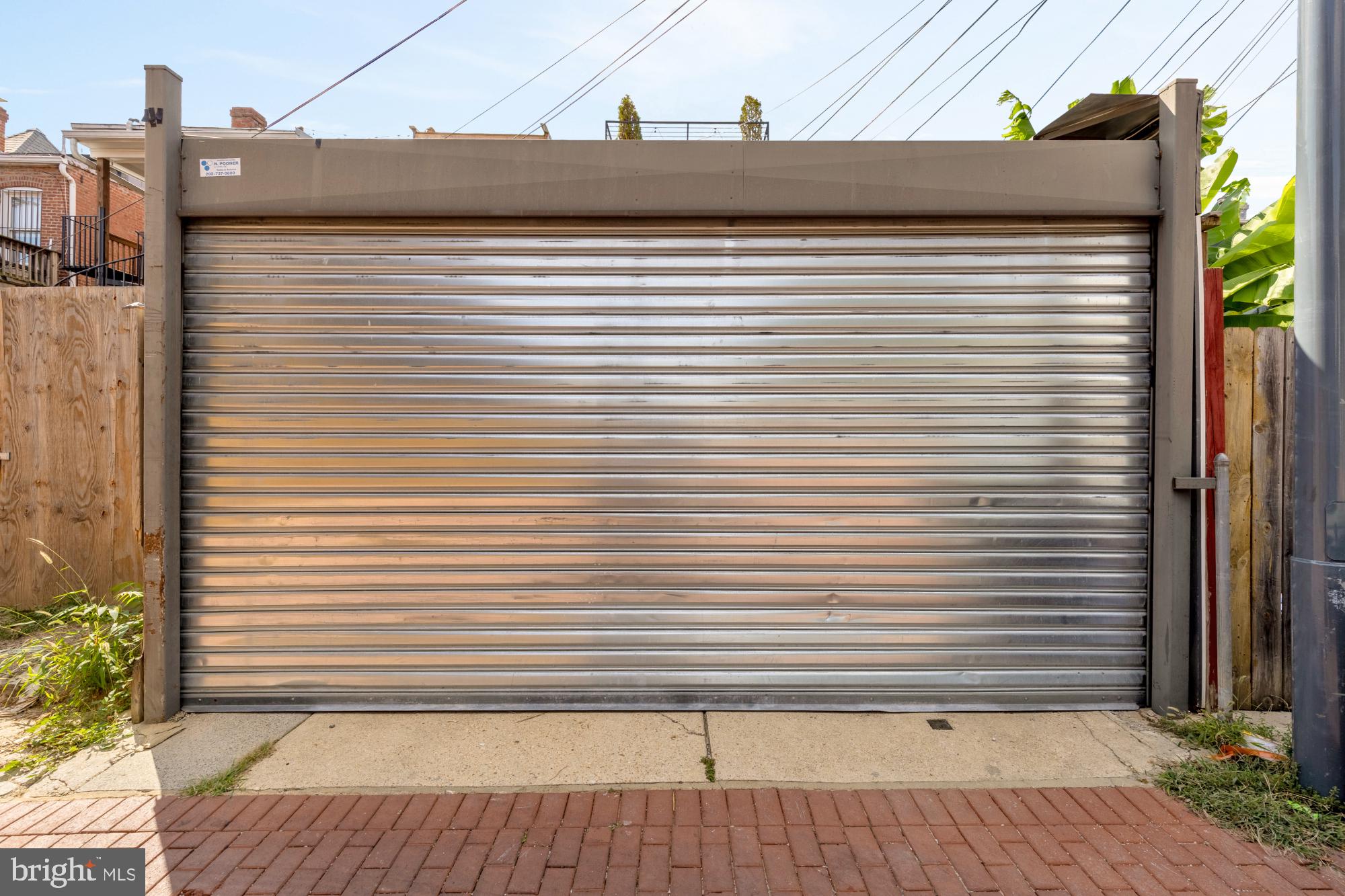 1735 1st Street Northwest, Unit 2 Washington, DC 20001 - Photo 37 of 38 a view of a street with a garage