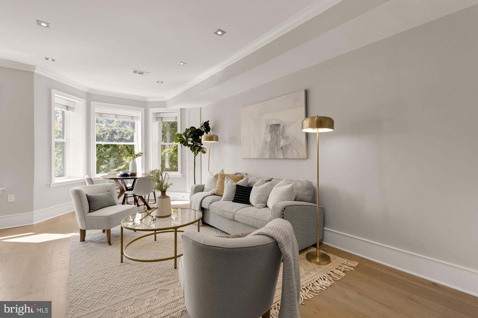 1735 1st Street Northwest, Unit 2 Washington, DC 20001 - Photo 10 of 38 a living room with furniture and a large window