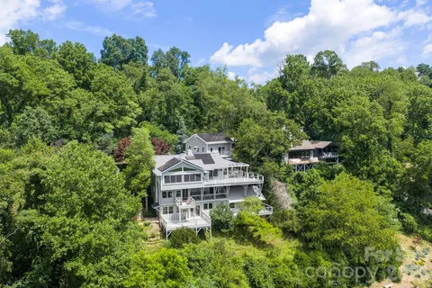 an aerial view of a house with a garden