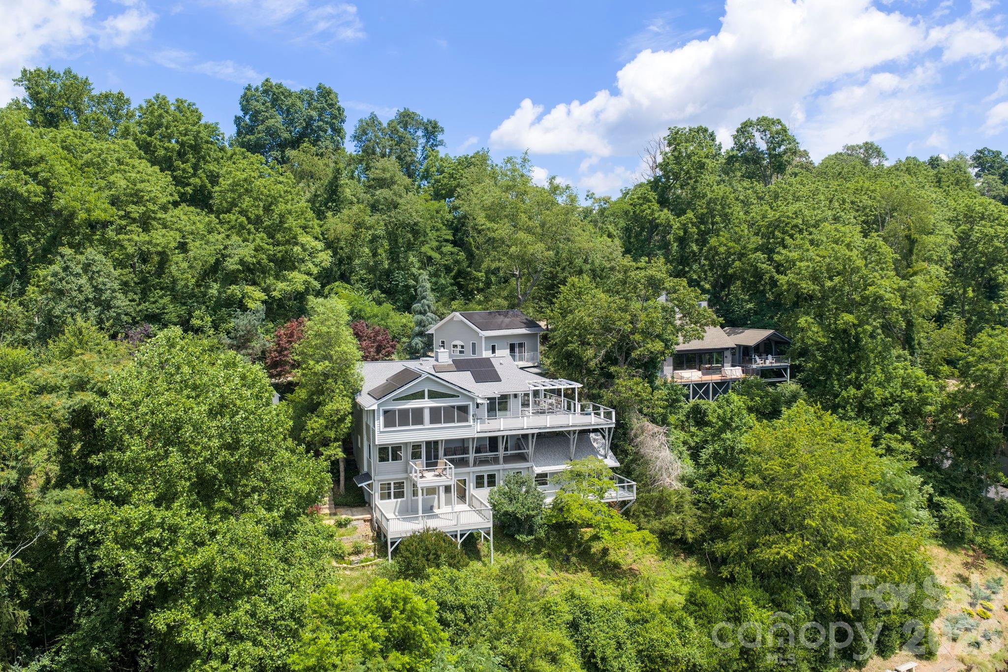 38 Lookout Road Asheville, NC 28804 - Photo 7 of 34 an aerial view of a house with a garden