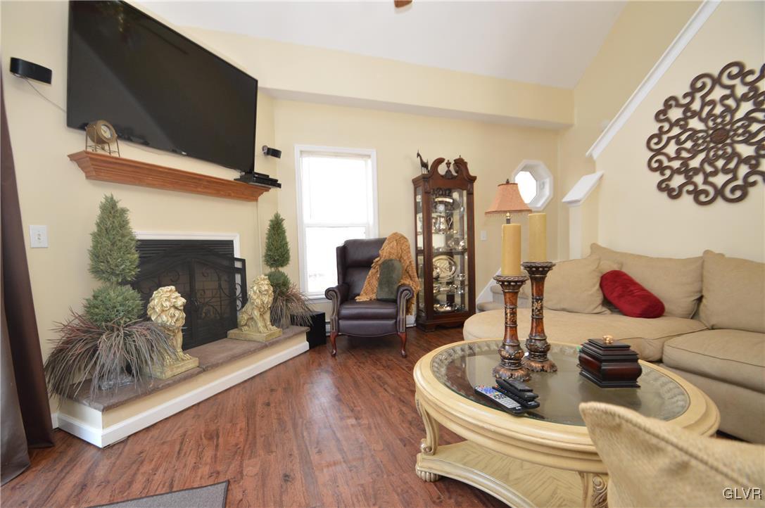 1121 Boulder Road Blakeslee, PA 18610 - Photo 3 of 25 a living room with furniture and a fireplace