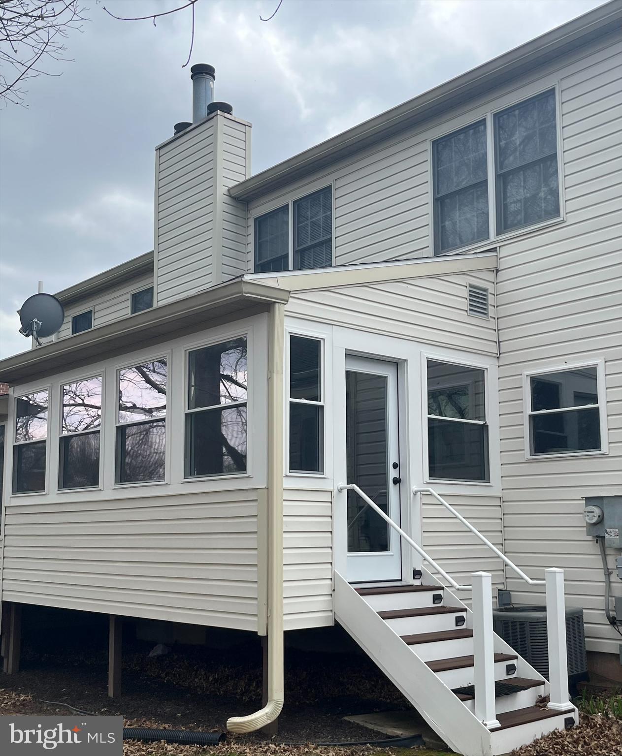 2029 Raleigh Road Hummelstown, PA 17036 - Photo 3 of 5 a front view of a house with many windows