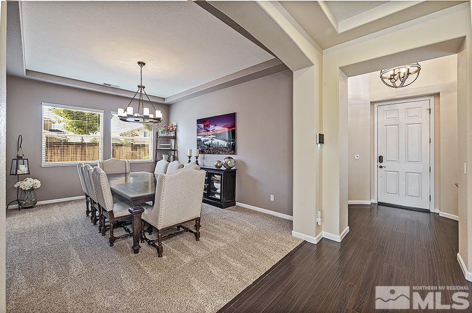 1578 Gemtown Court Reno, NV 89521 - Photo 3 of 25 a view of a dining room with furniture window and wooden floor