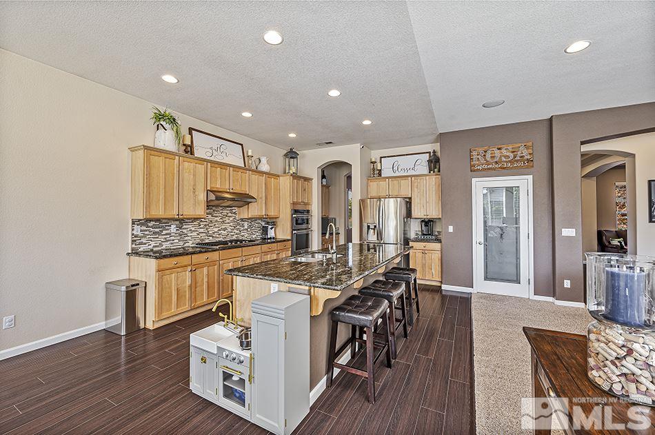 1578 Gemtown Court Reno, NV 89521 - Photo 9 of 25 a living room with furniture and wooden floor