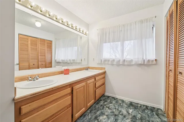 a bathroom with a sink and a bathtub