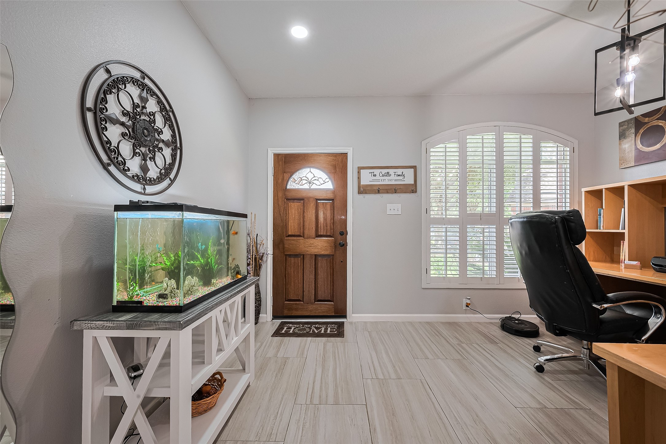 723 Pine Thicket Court Spring, TX 77373 - Photo 8 of 40 a view of a workspace with furniture and a window